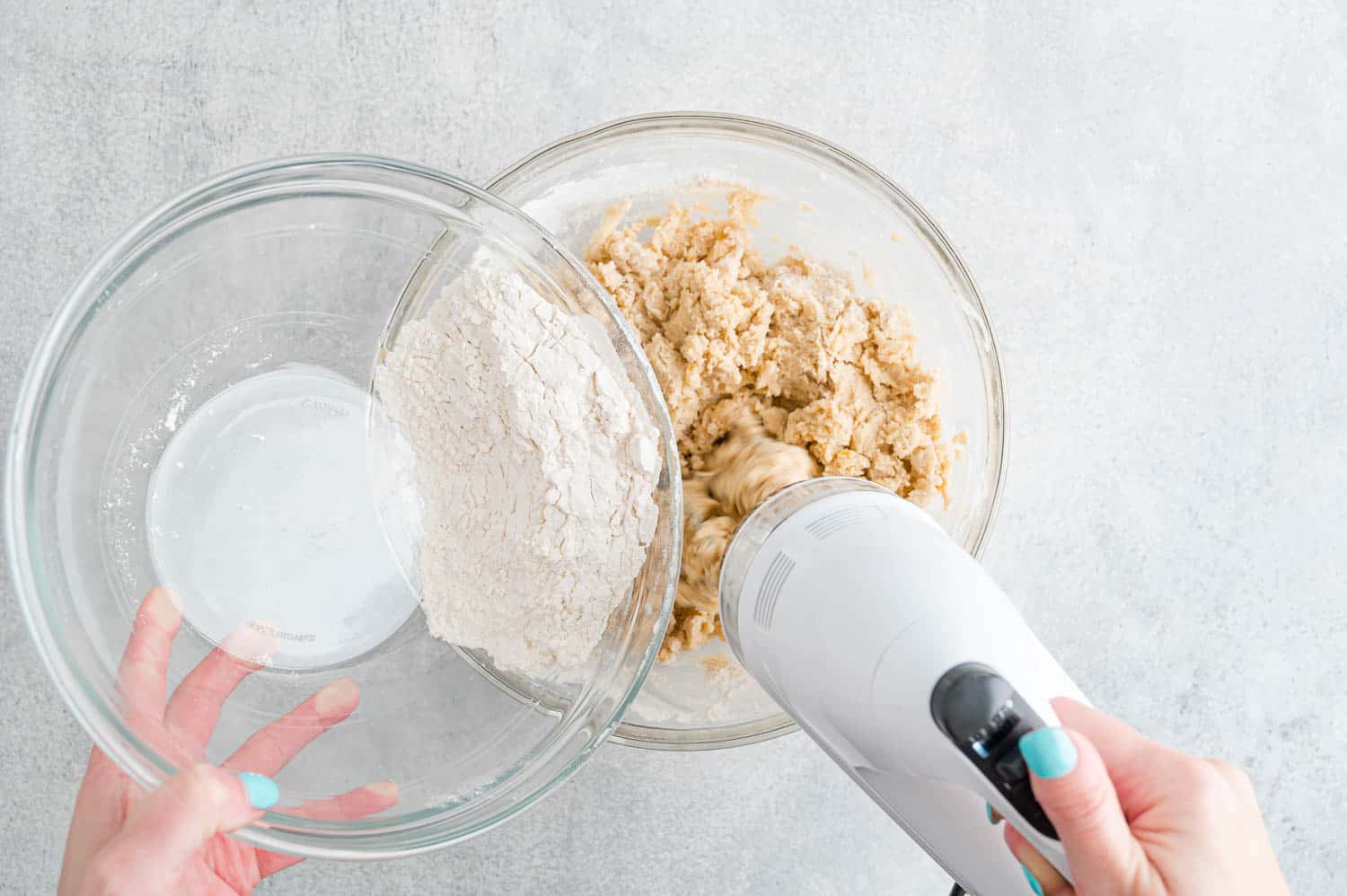 Flour being added to dough.