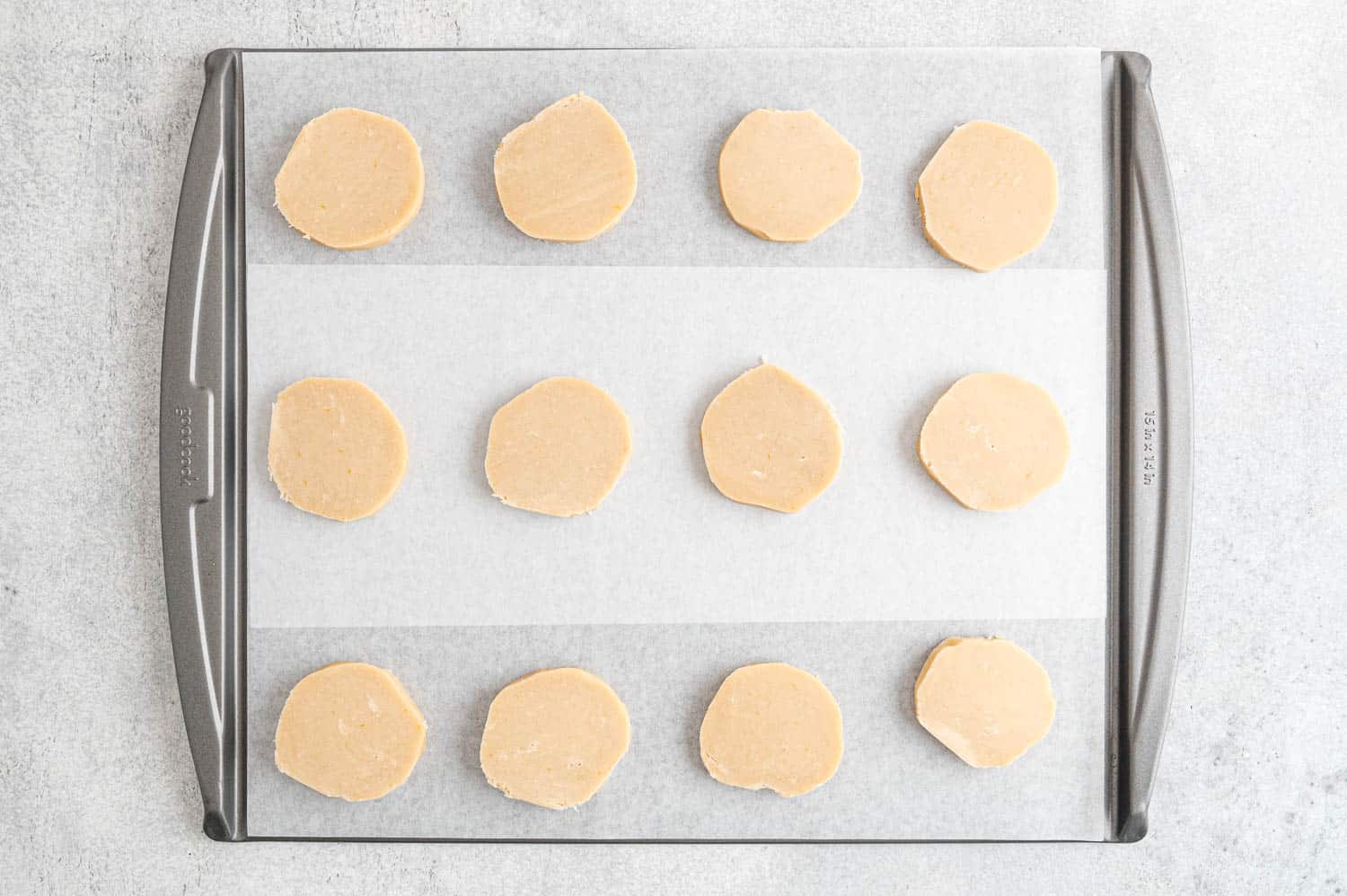 Unbaked cookies on pan.
