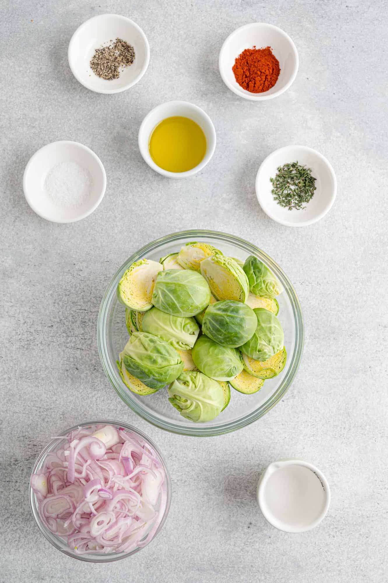 Ingredients needed for recipe, including fresh Brussels sprouts.