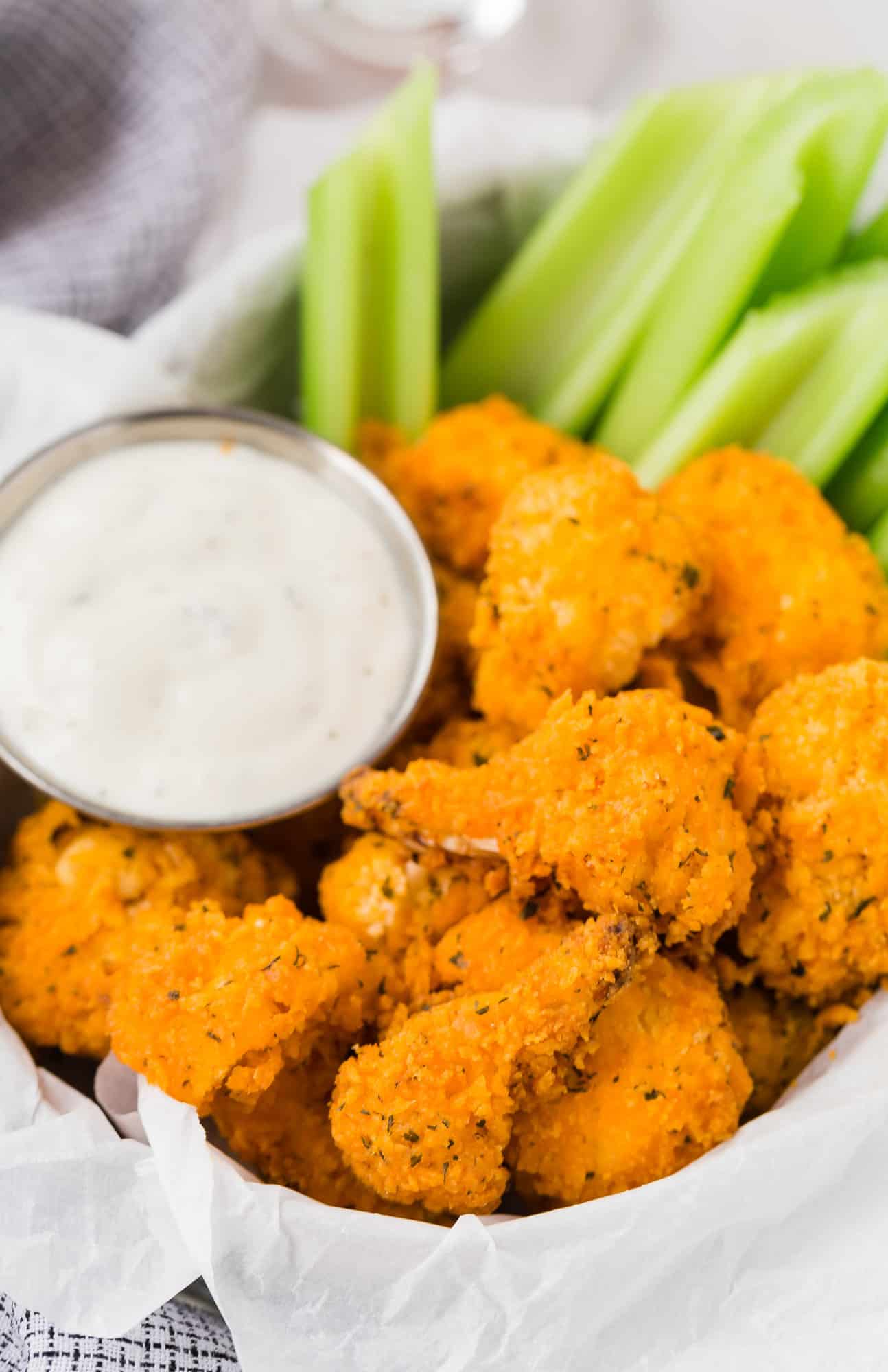 Cauliflower wings with dipping sauce.