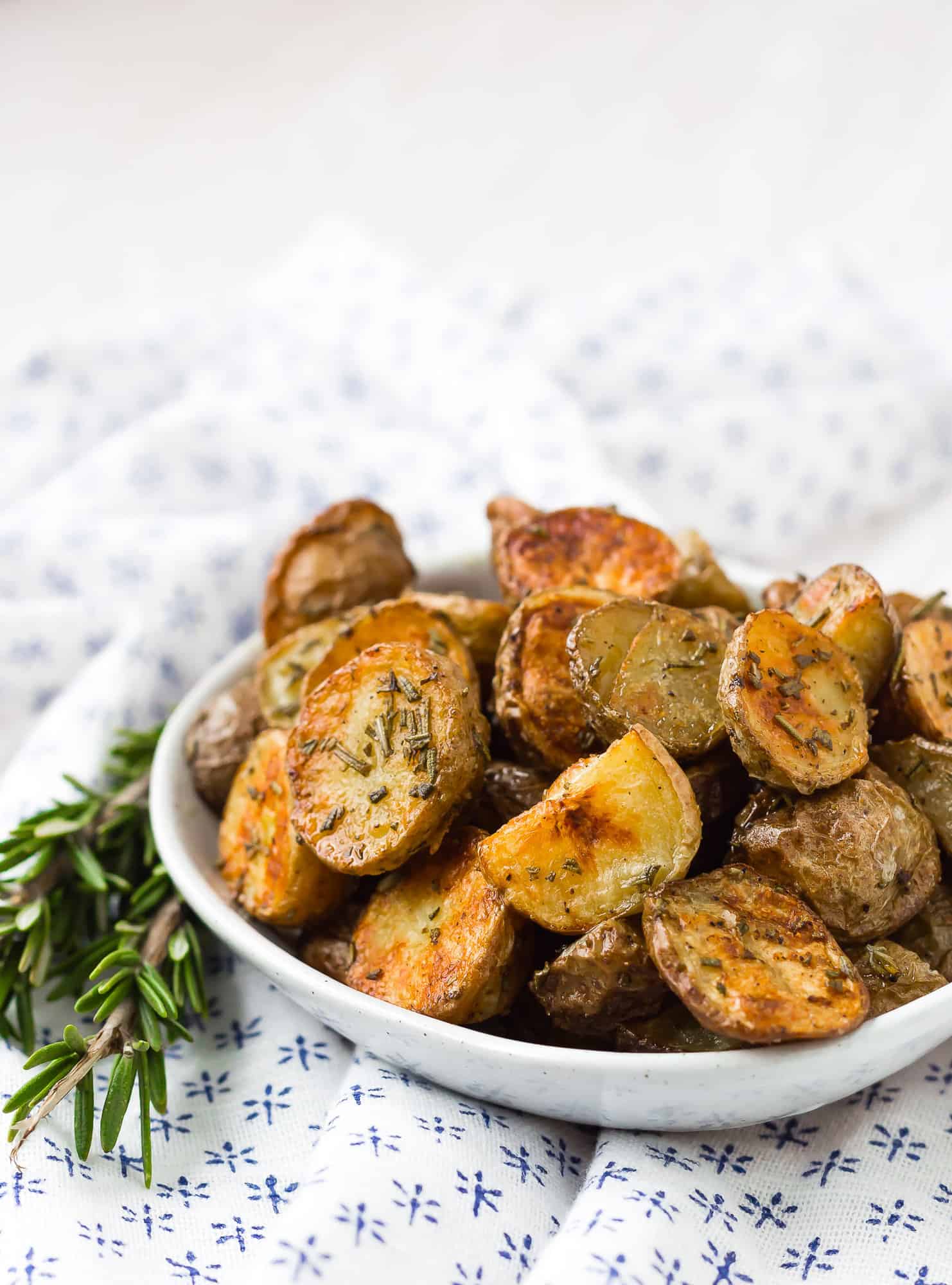 Golden brown potatoes in a small bowl.