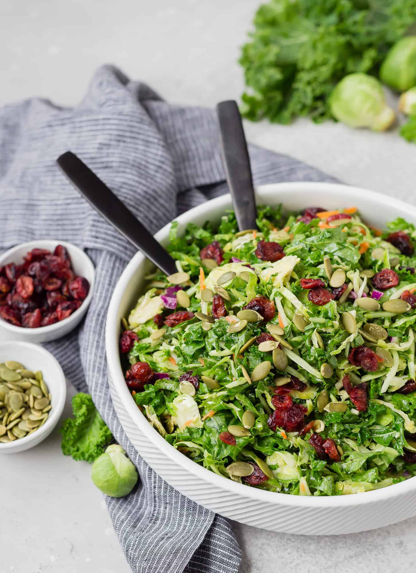 Salad with kale, brussels sprouts, broccoli slaw, pepitas.