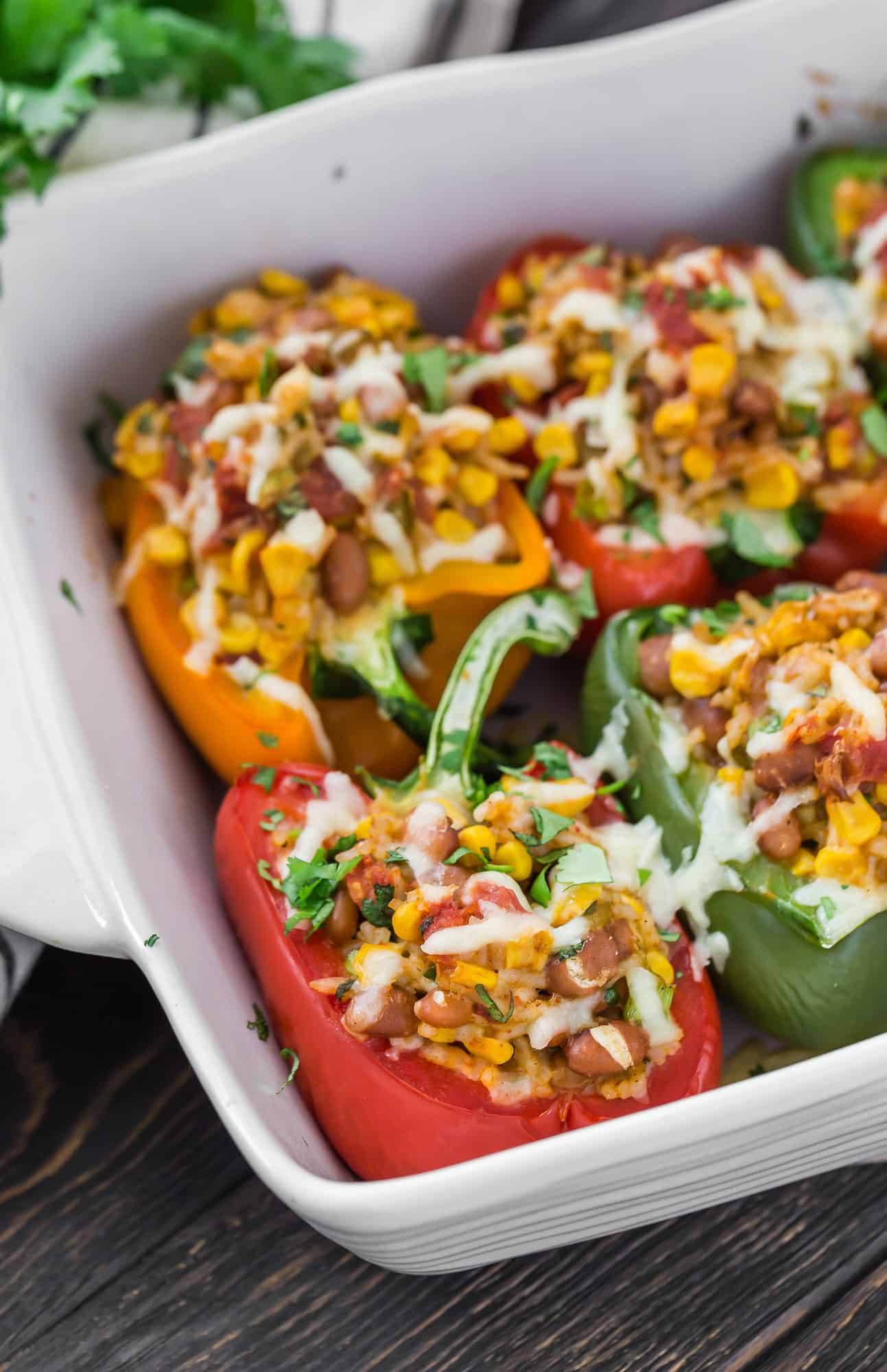 Stuffed peppers in a casserole dish.