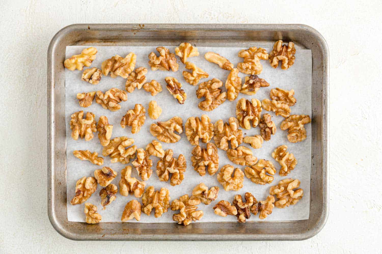 Walnuts on a sheet pan.