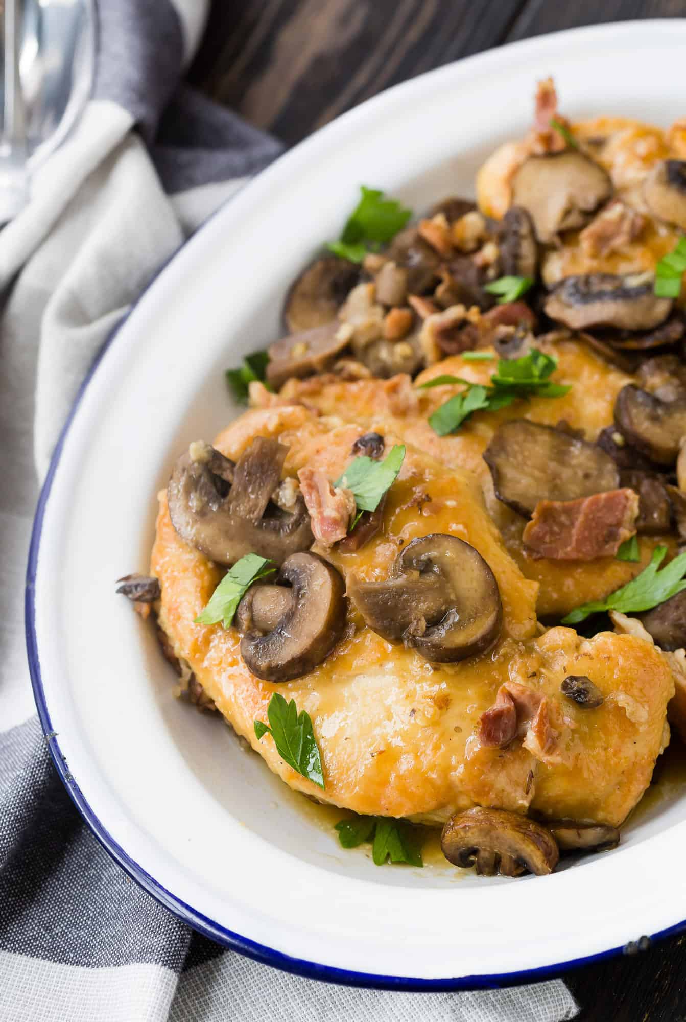 Instant pot chicken marsala on white platter.