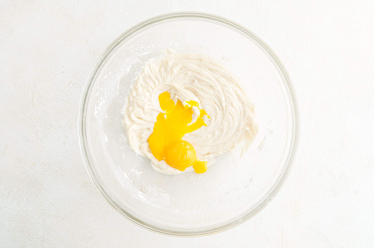Eggs added to butter and sugar.