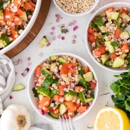 Barley Salad in multiple bowls, ingredients also visible.