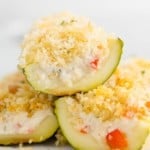 Boursin stuffed zucchini stacked on top of each other.