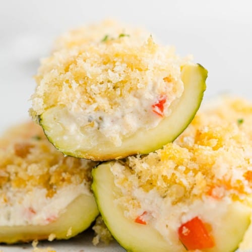 Boursin stuffed zucchini stacked on top of each other.