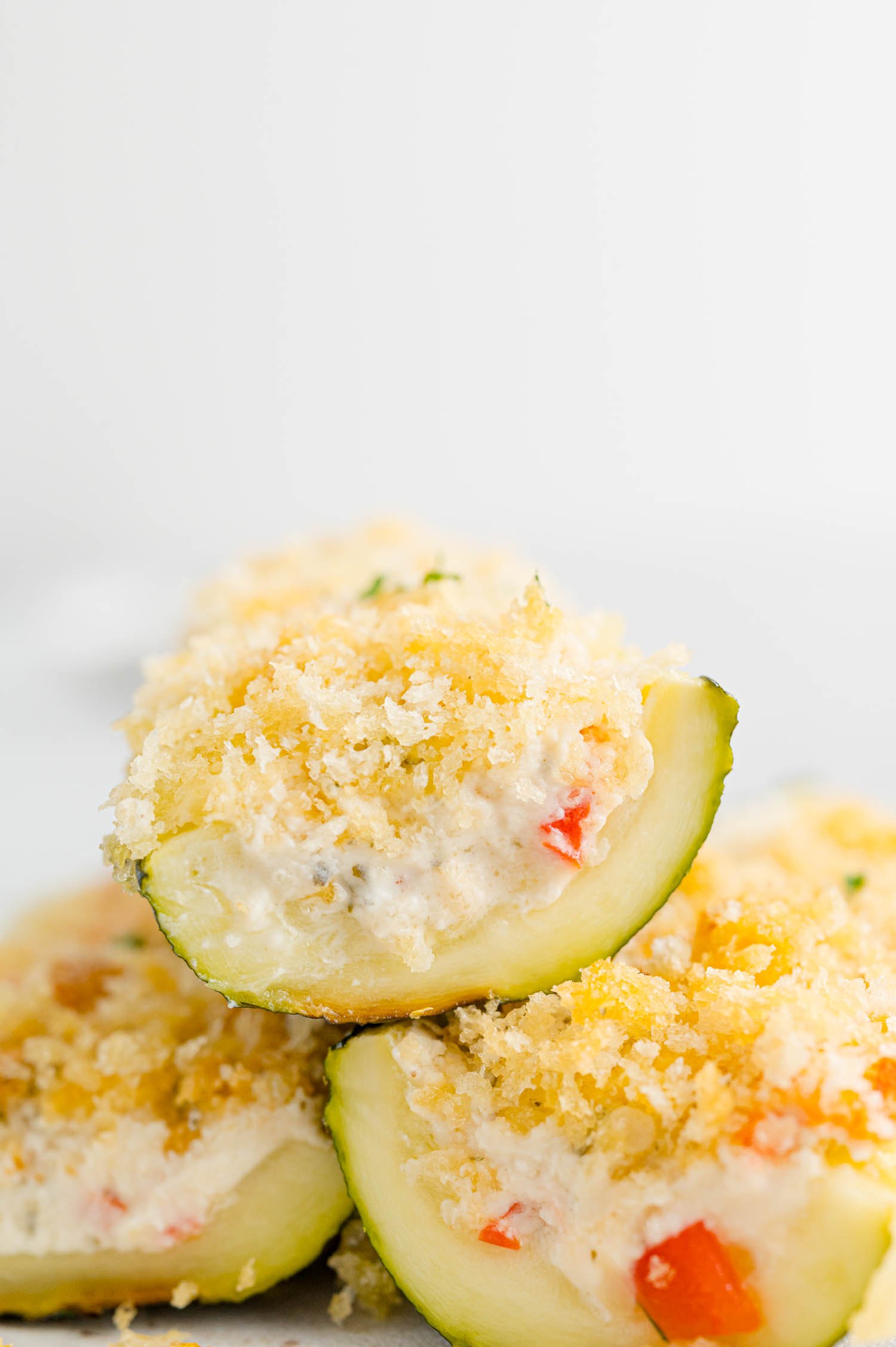 Zucchini cut in half to show filling.