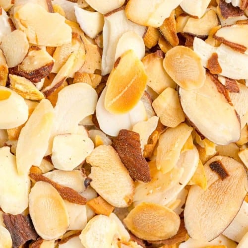 Close up view of toasted sliced almonds.