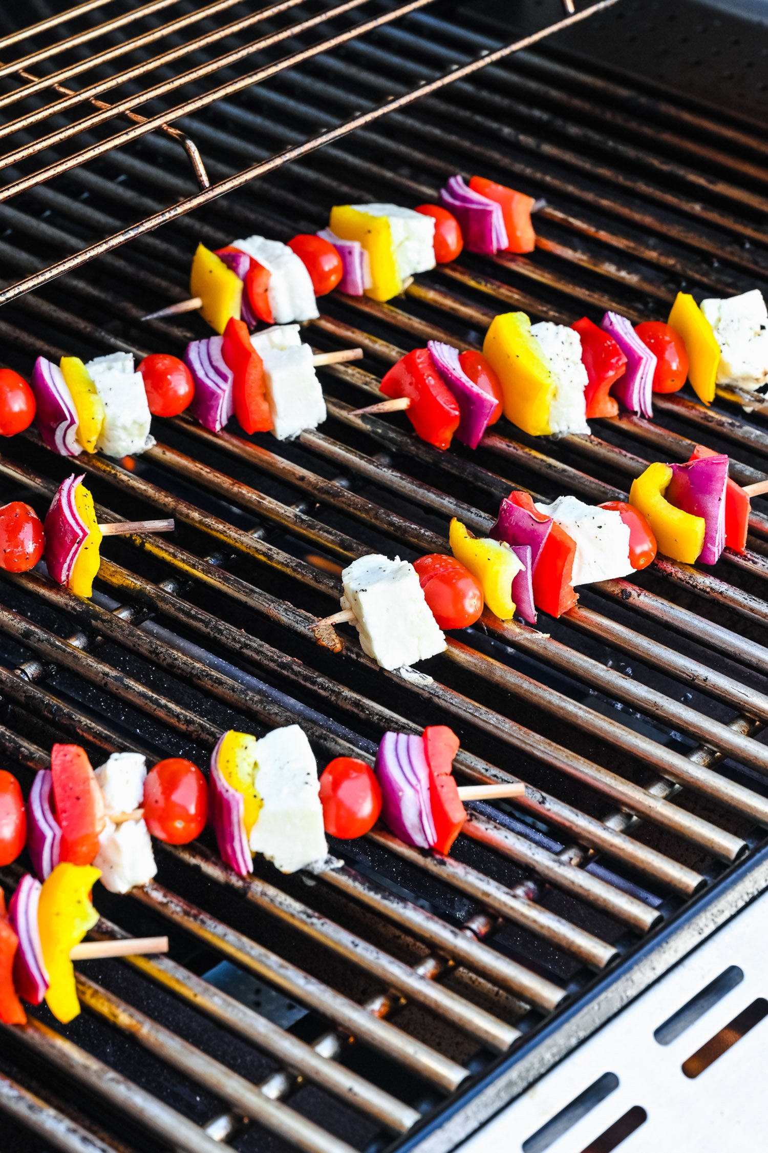 Halloumi on kebabs.