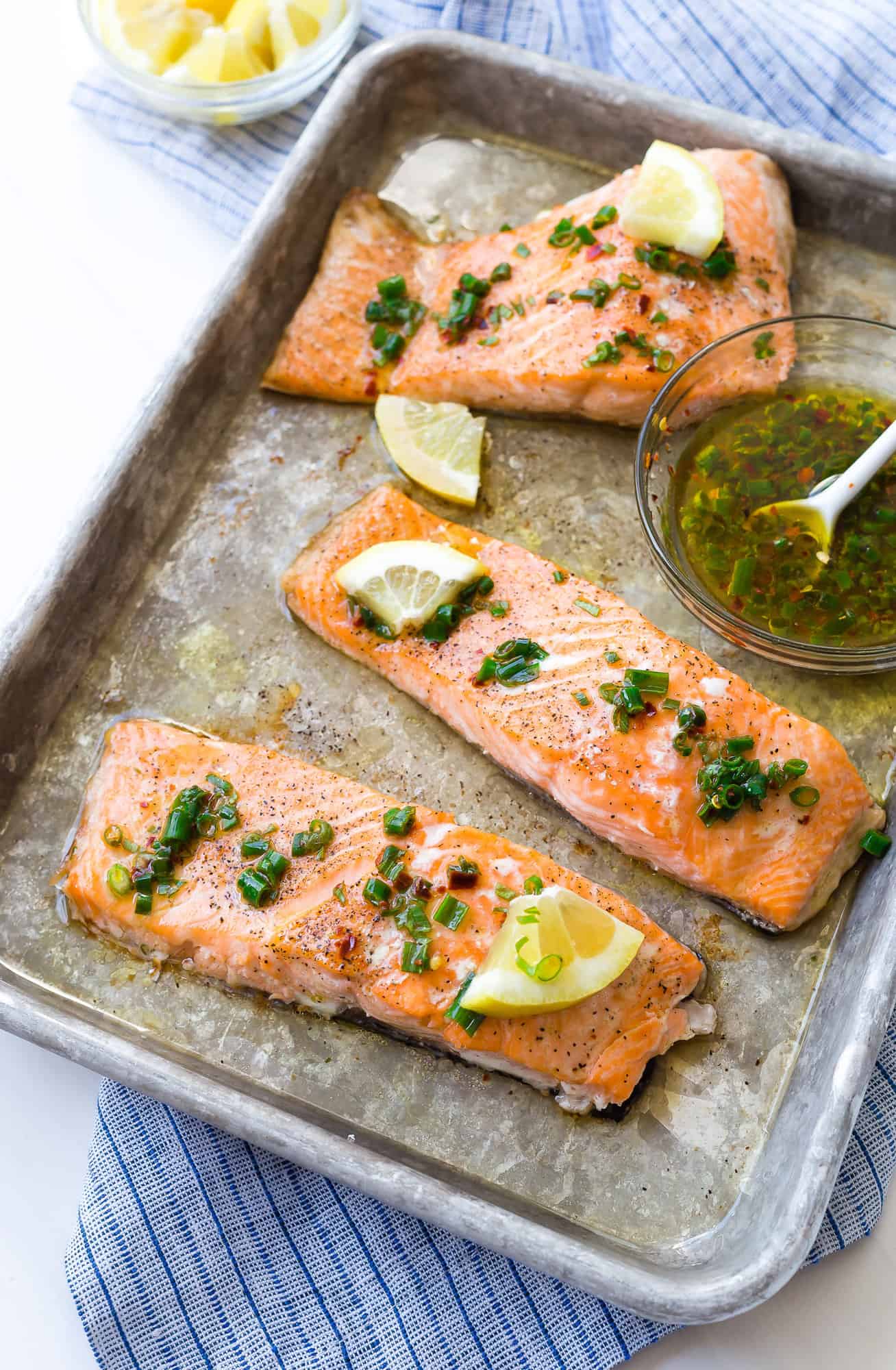 Sheet pan baked salmon with lemon and chive topping.