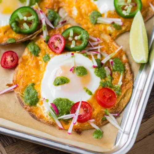 Sheet pan breakfast tostada with tomatoes, jalapeno, radish.