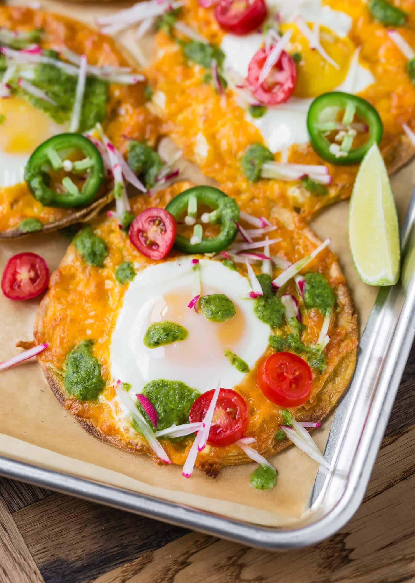 Breakfast tostada with egg and salsa verde.