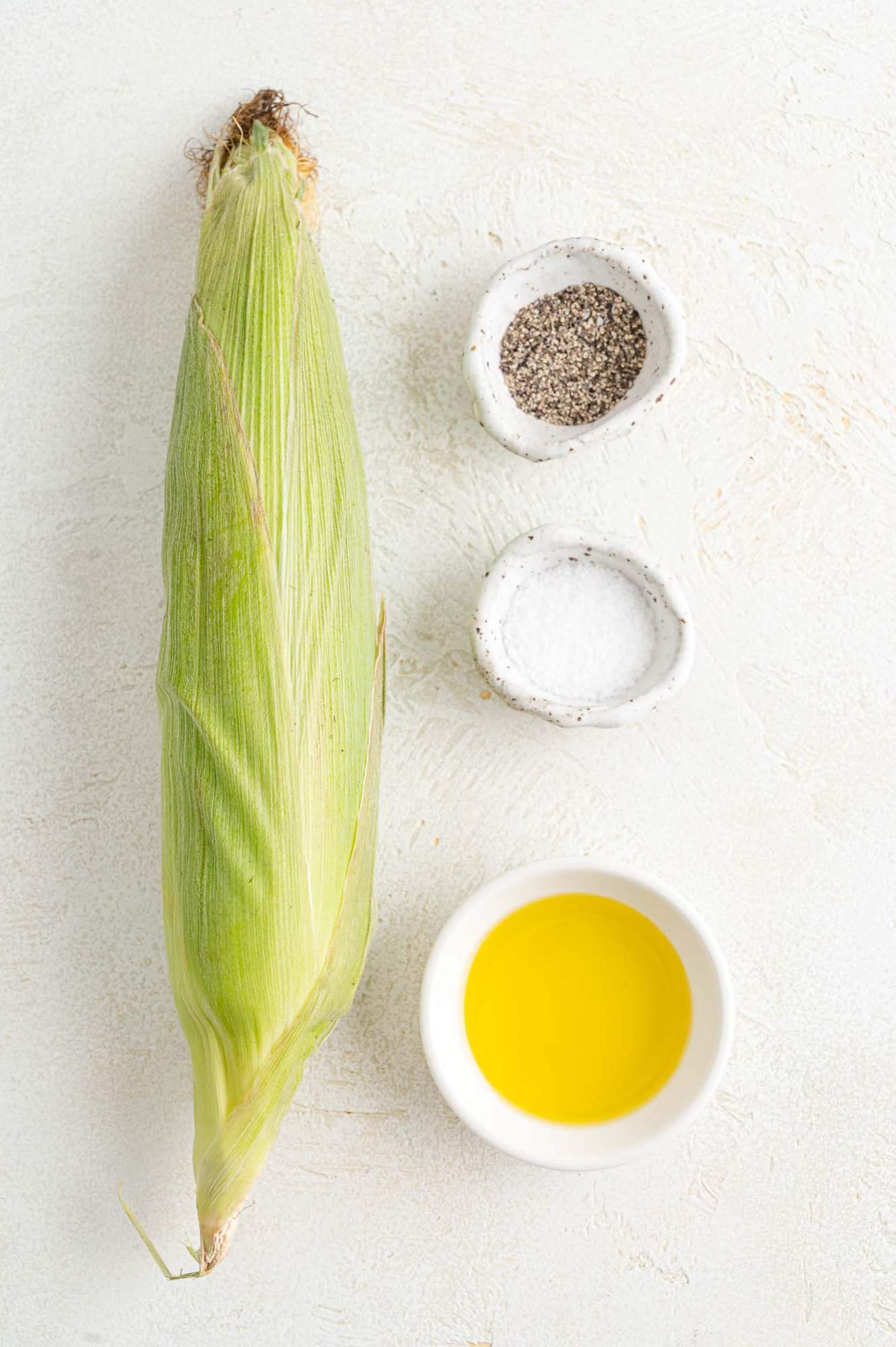 The ingredients for air fryer corn on the cob.