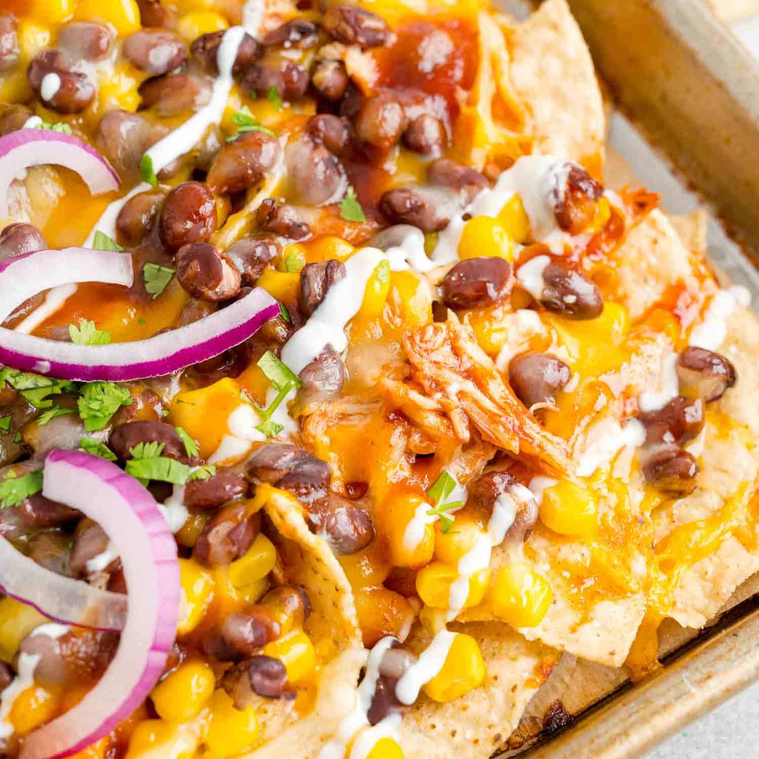 BBQ Chicken nachos with toppings.