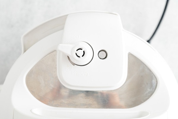 Close up of an Instant Pot lid set to "sealing".