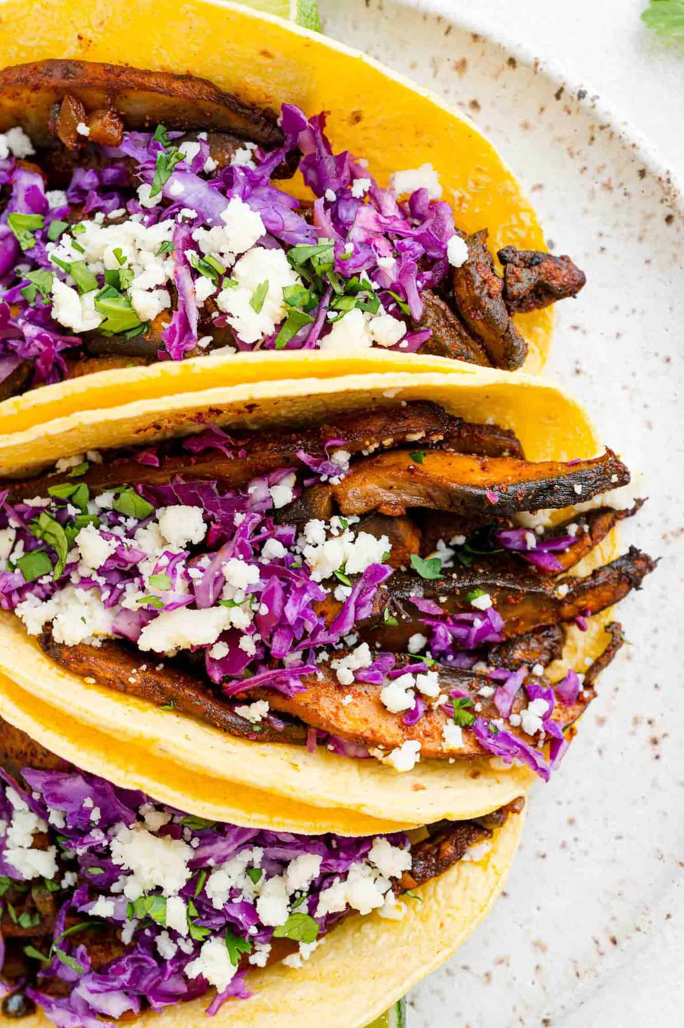 Mushroom tacos on corn tortillas.