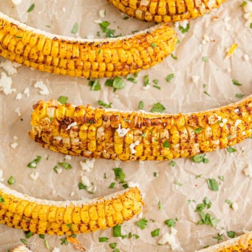 Corn ribs sprinkled with cotija cheese and cilantro.