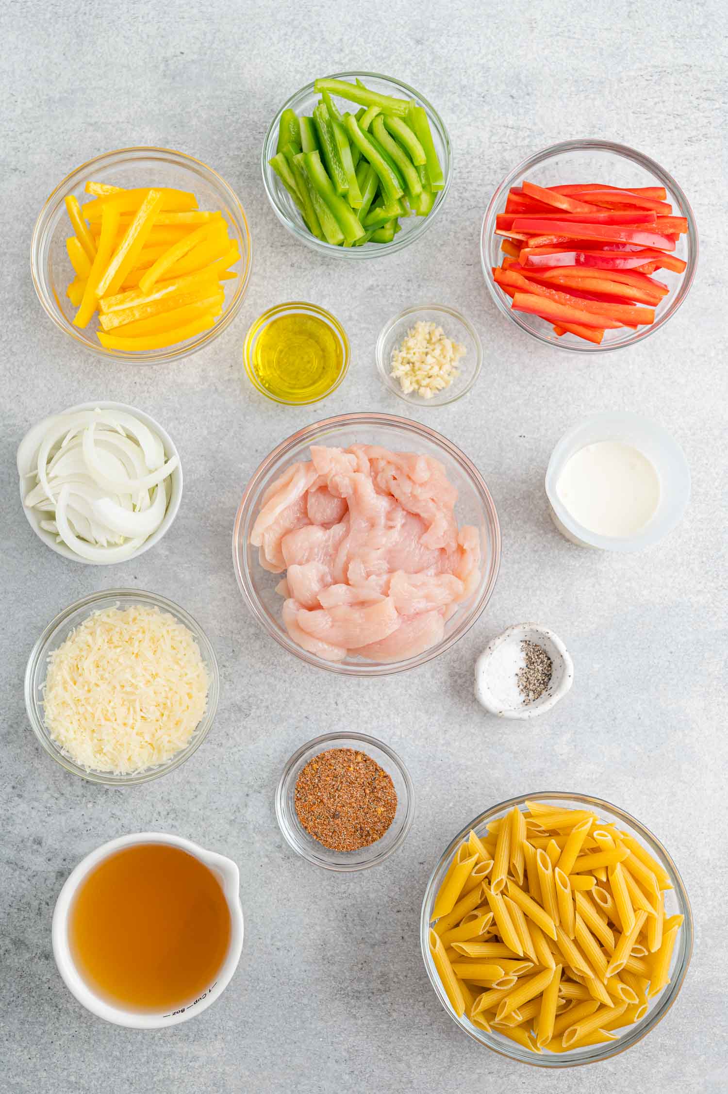 Creamy Rasta Pasta is an easy weeknight dinner packed with color and flavor. Made with tender chicken, bell peppers, and jerk seasoning. The ingredients for Rasta Pasta.