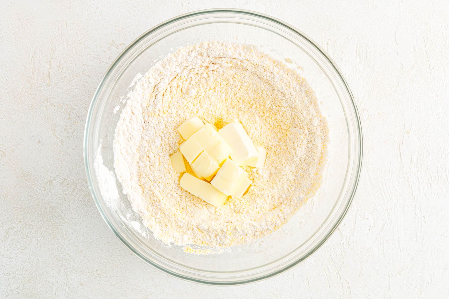 Butter added to dry ingredients.