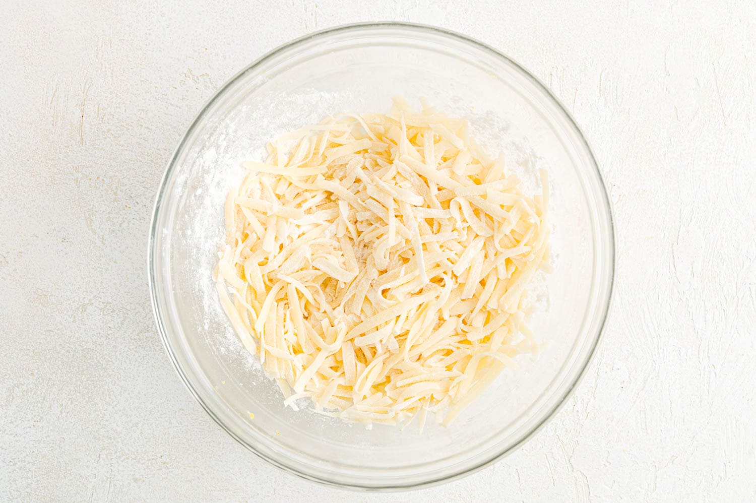 Cheese tossed with flour.