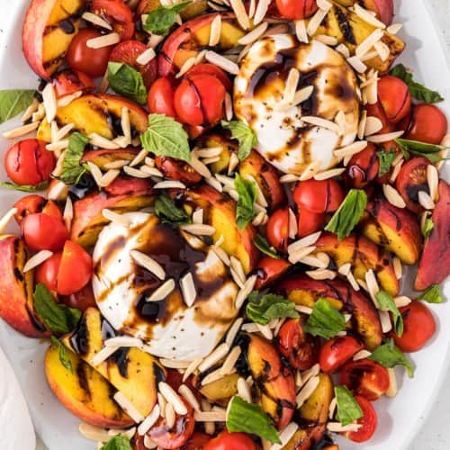 Grilled peach salad with burrata cheese.