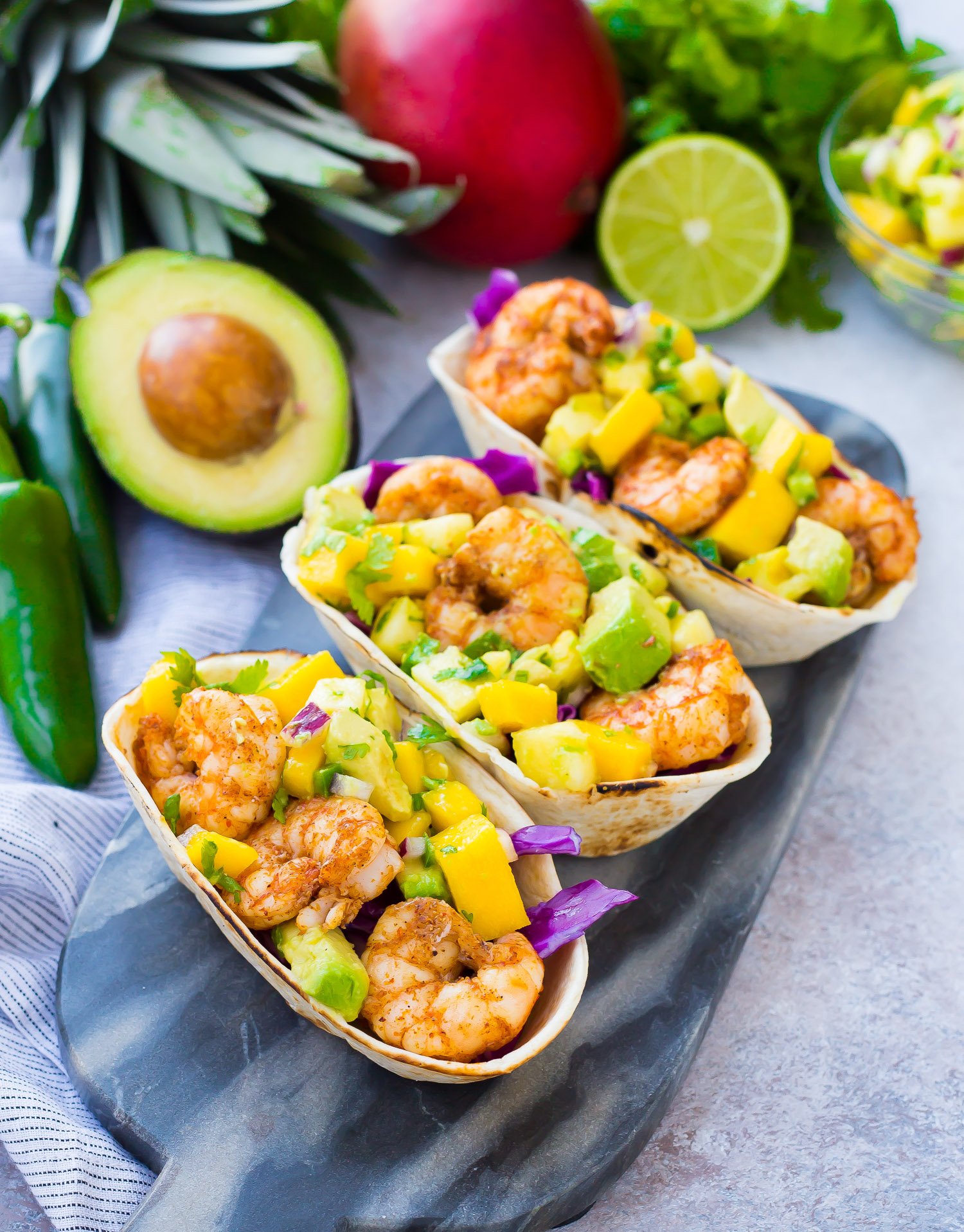 Shrimp tacos with avocado mango salsa.