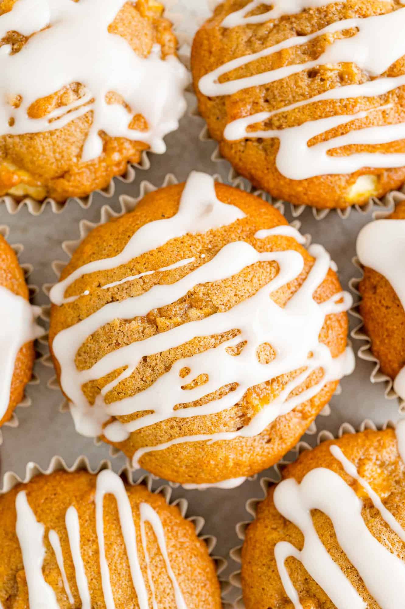 muffin-with-butter Overhead view of muffins with icing.
