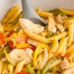 Rasta past in pan - penne pasta, peppers, and spices.