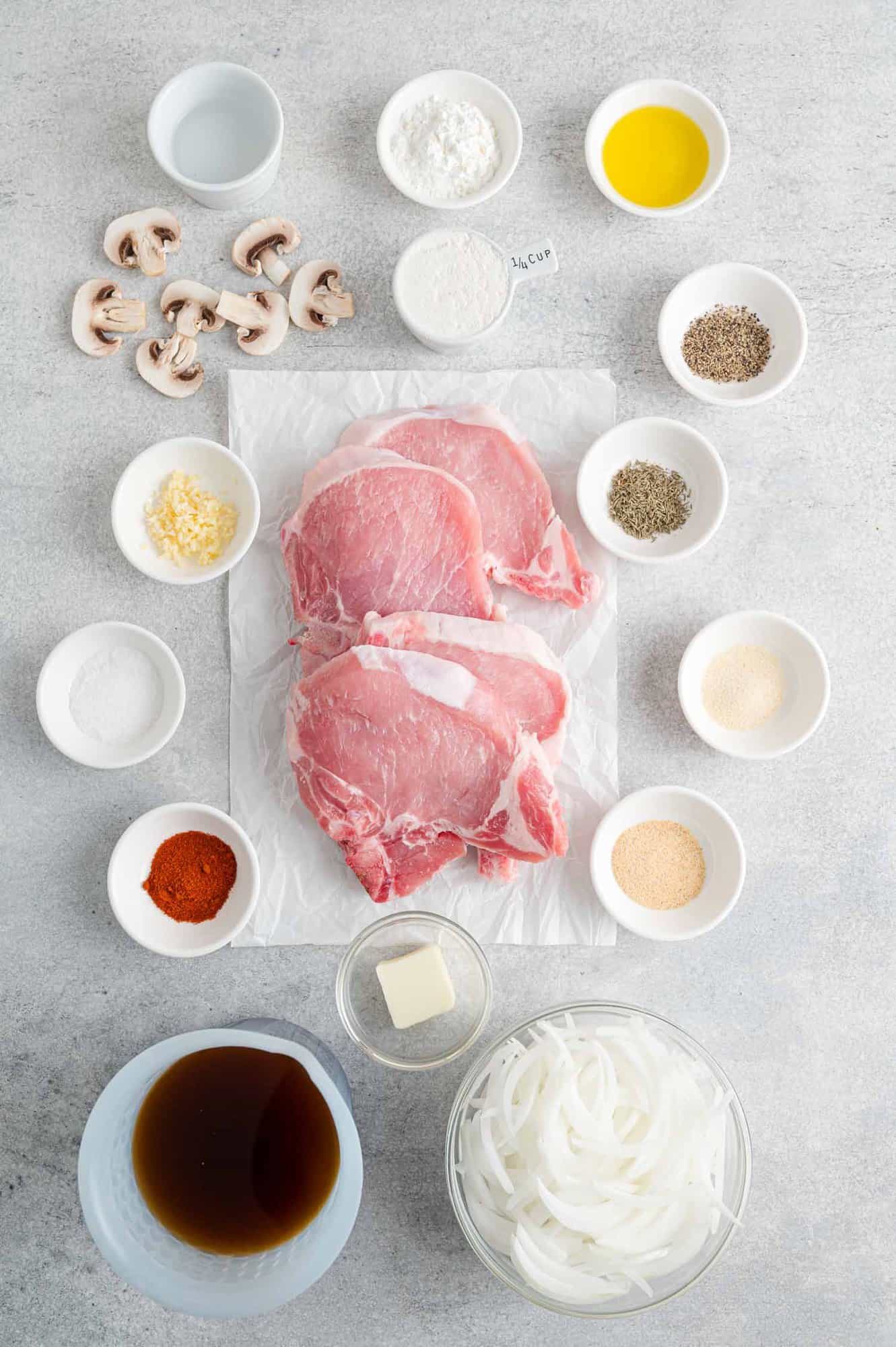 Incredible slow cooker pork chops smothered in a rich mushroom and onion gravy. They're quick to prep and then your slow cooker does the rest! The ingredients for slow cooker pork chops.