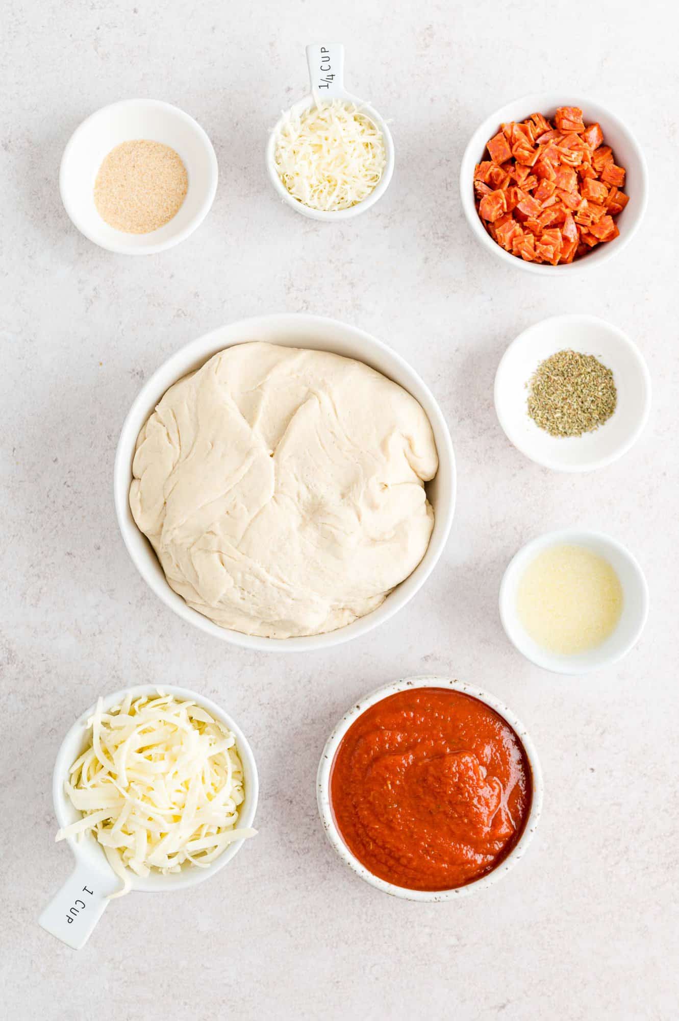 Ingredients needed for recipe, including pizza dough.