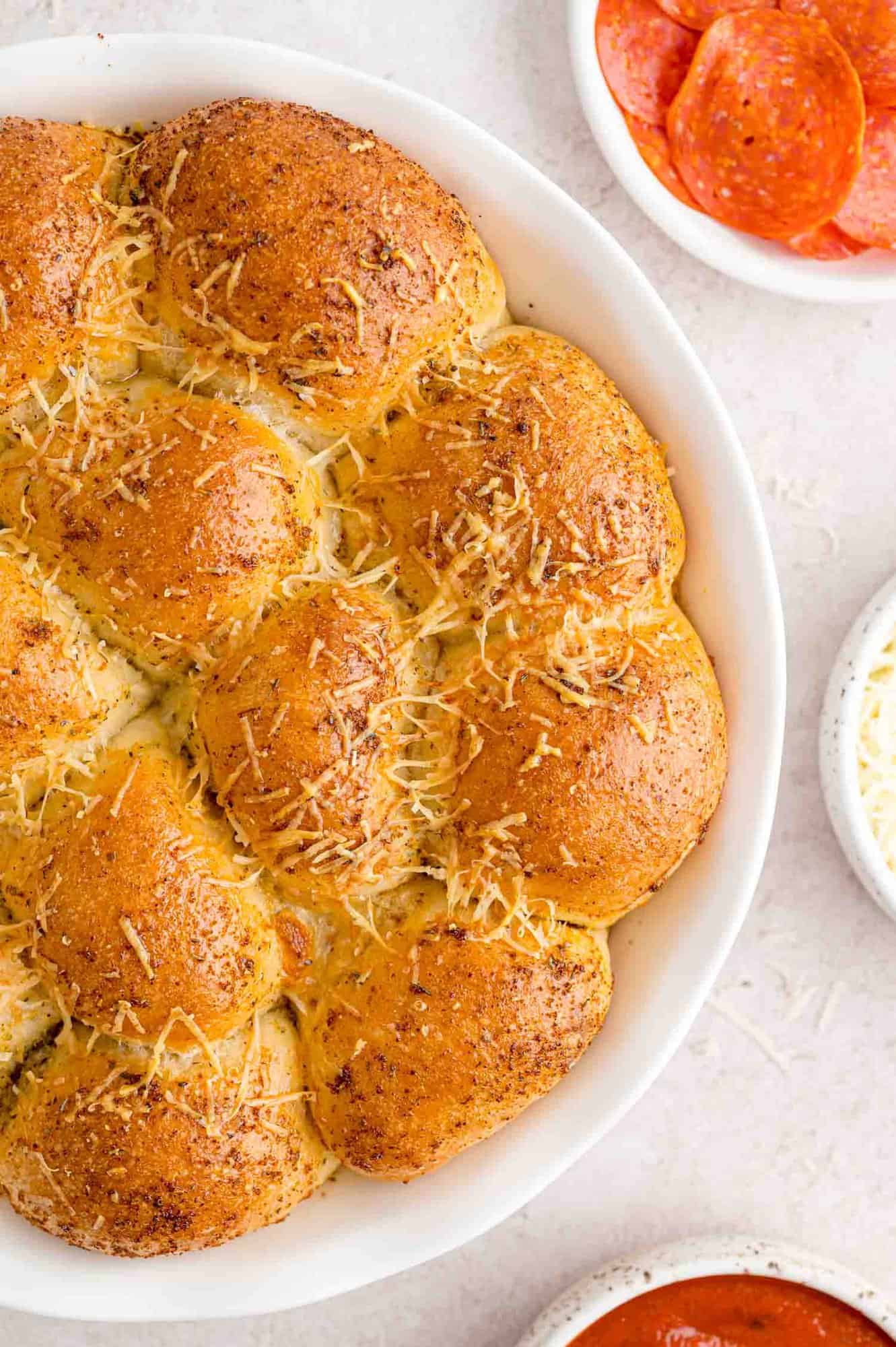 Baked pizza bites, still in baking dish.