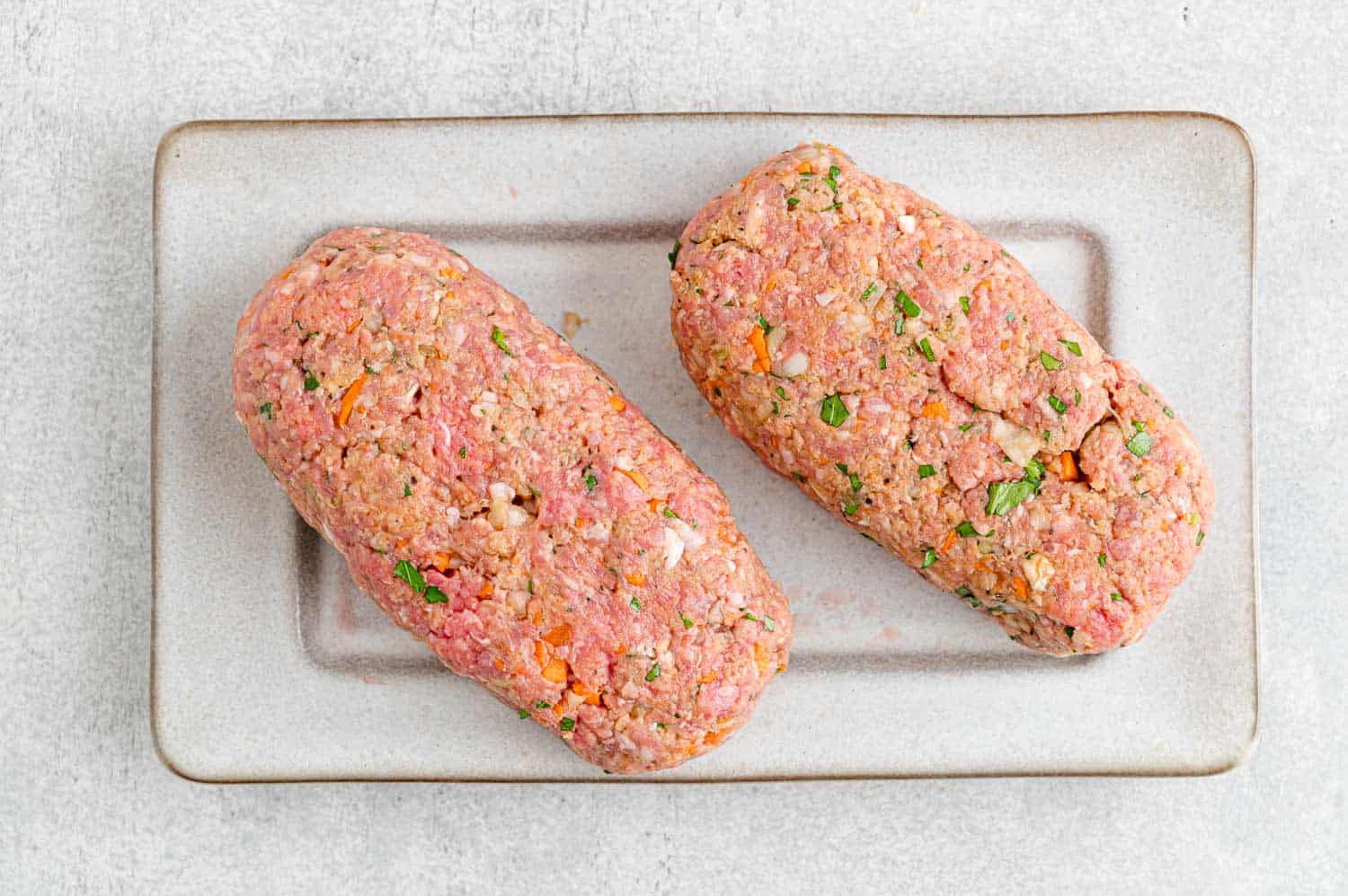 Meat formed into two loaves.