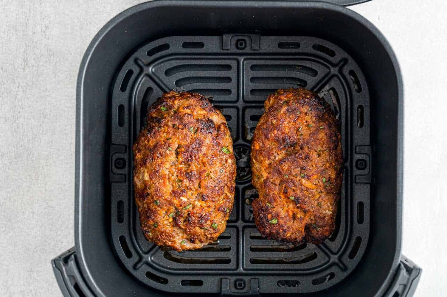 Air fryer meatloaves before adding glaze.