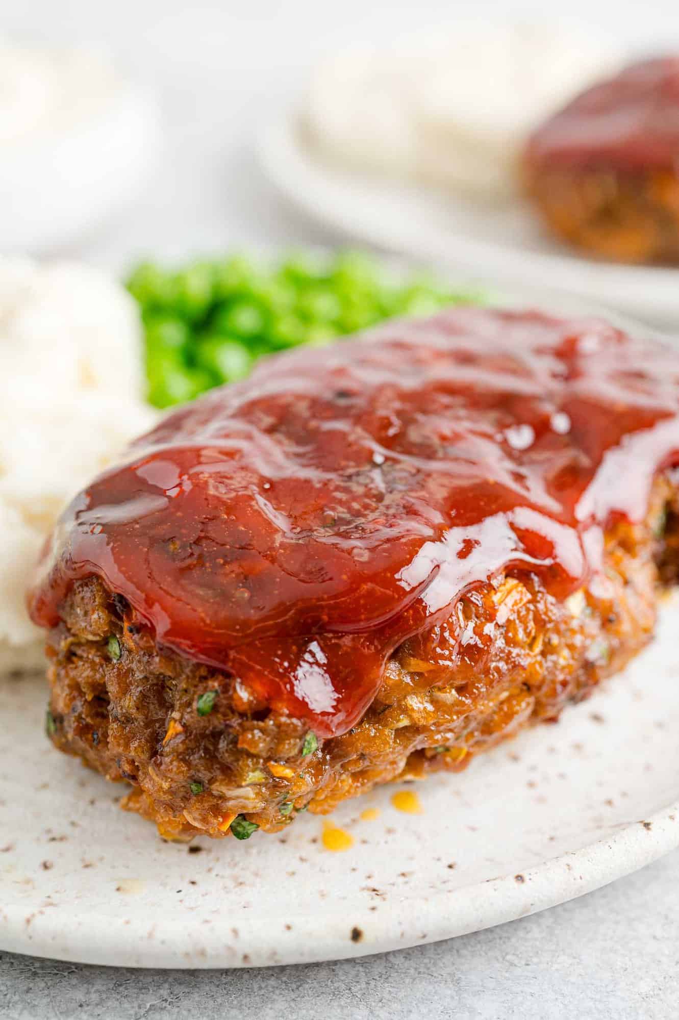 Air fryer meatloaf with shiny tomato based glaze.