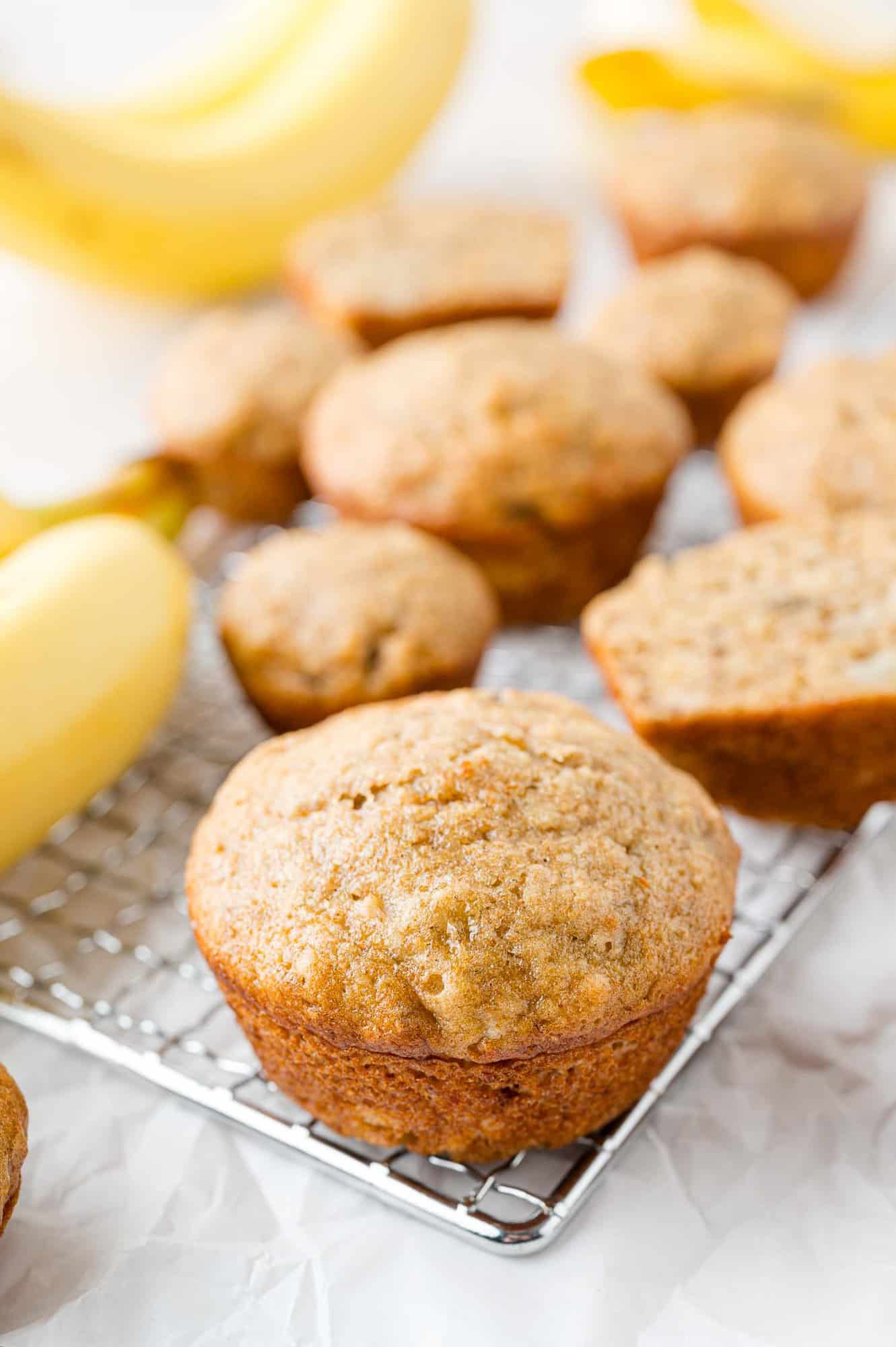 Baked muffins on cooling rack.