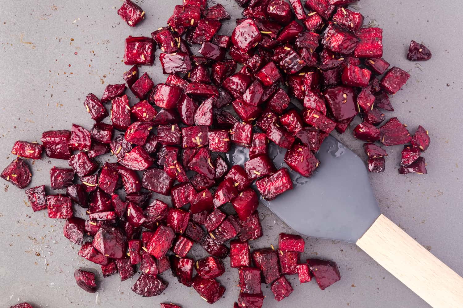 Roasted beets on a sheet pan.