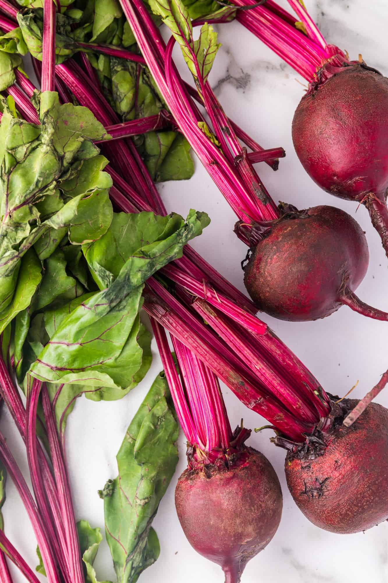 Fresh beets with greens still attached.