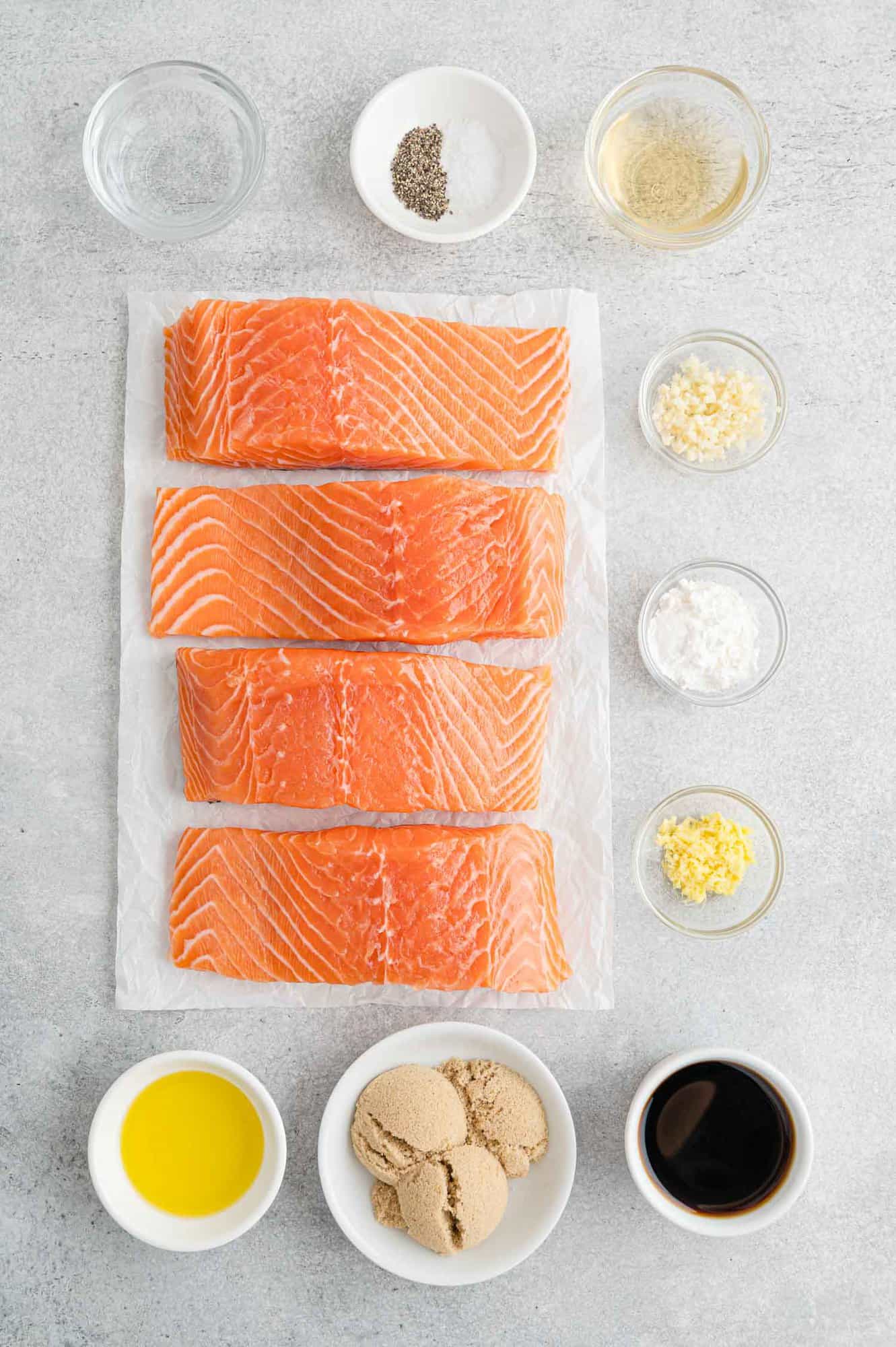 Ingredients needed for recipe, including salmon fillets.