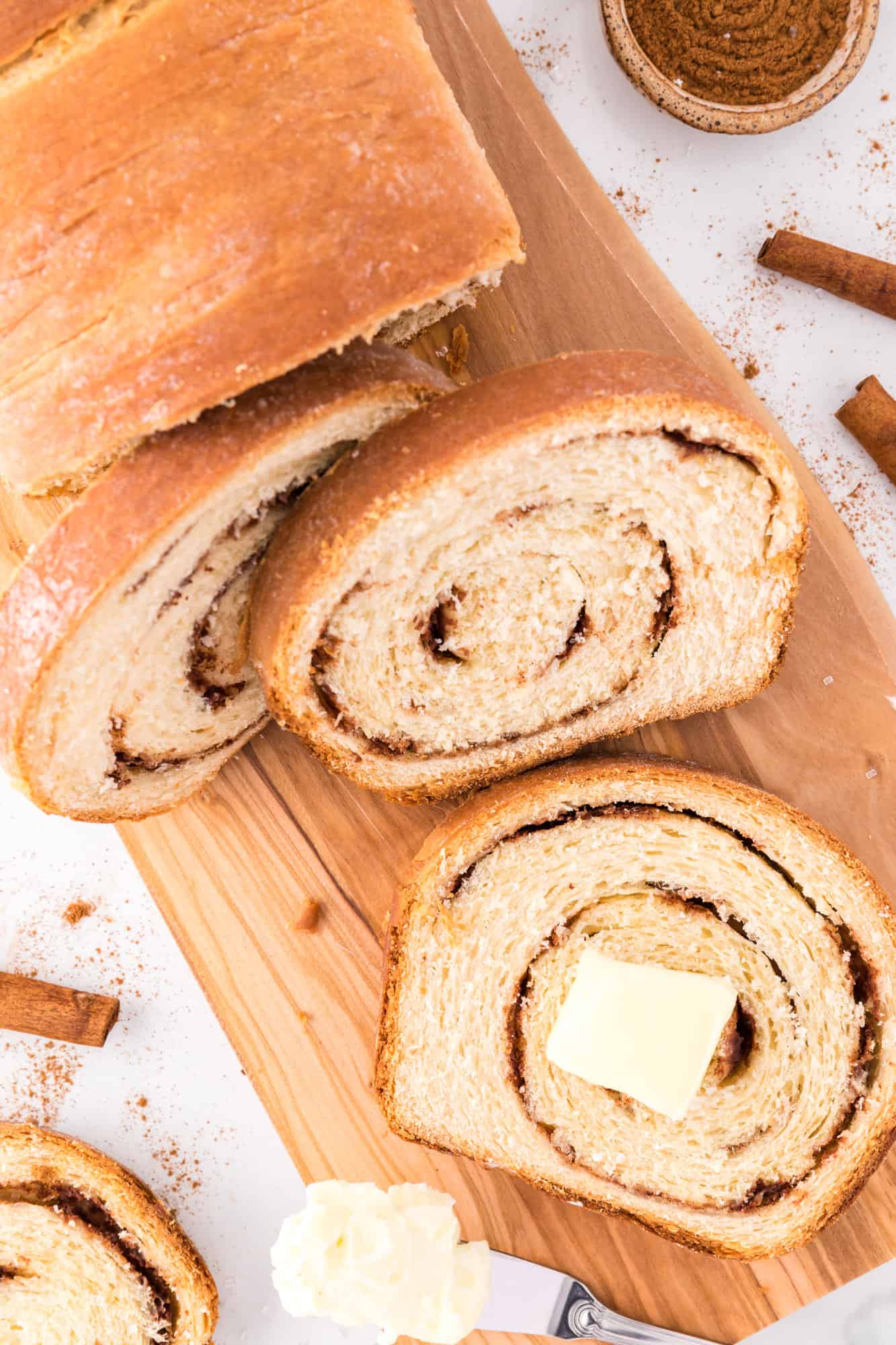 Cinnamon swirl bread sliced and topped with