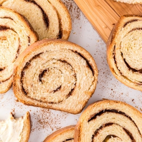 Cinnamon swirl bread cut into slices.