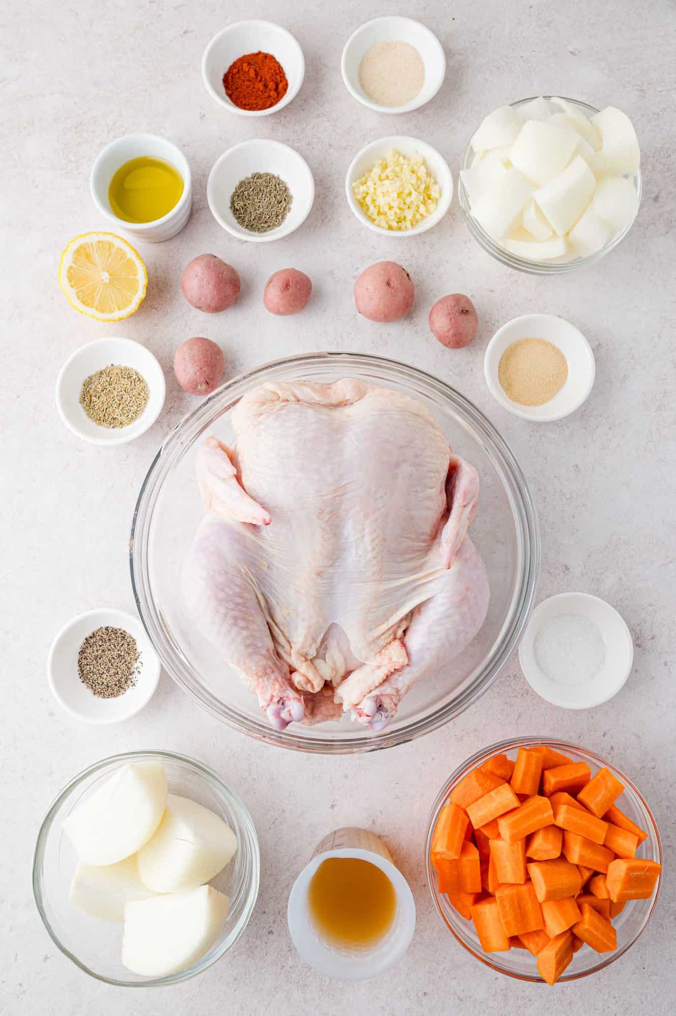 Ingredients needed for recipe, including a whole chicken.