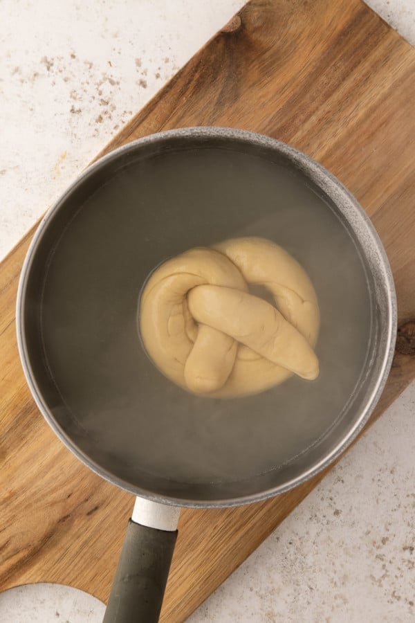 Soft pretzel in baking soda bath.