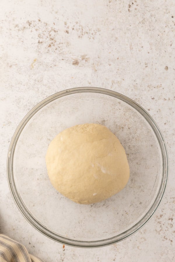 Dough in glass bowl before first rise.