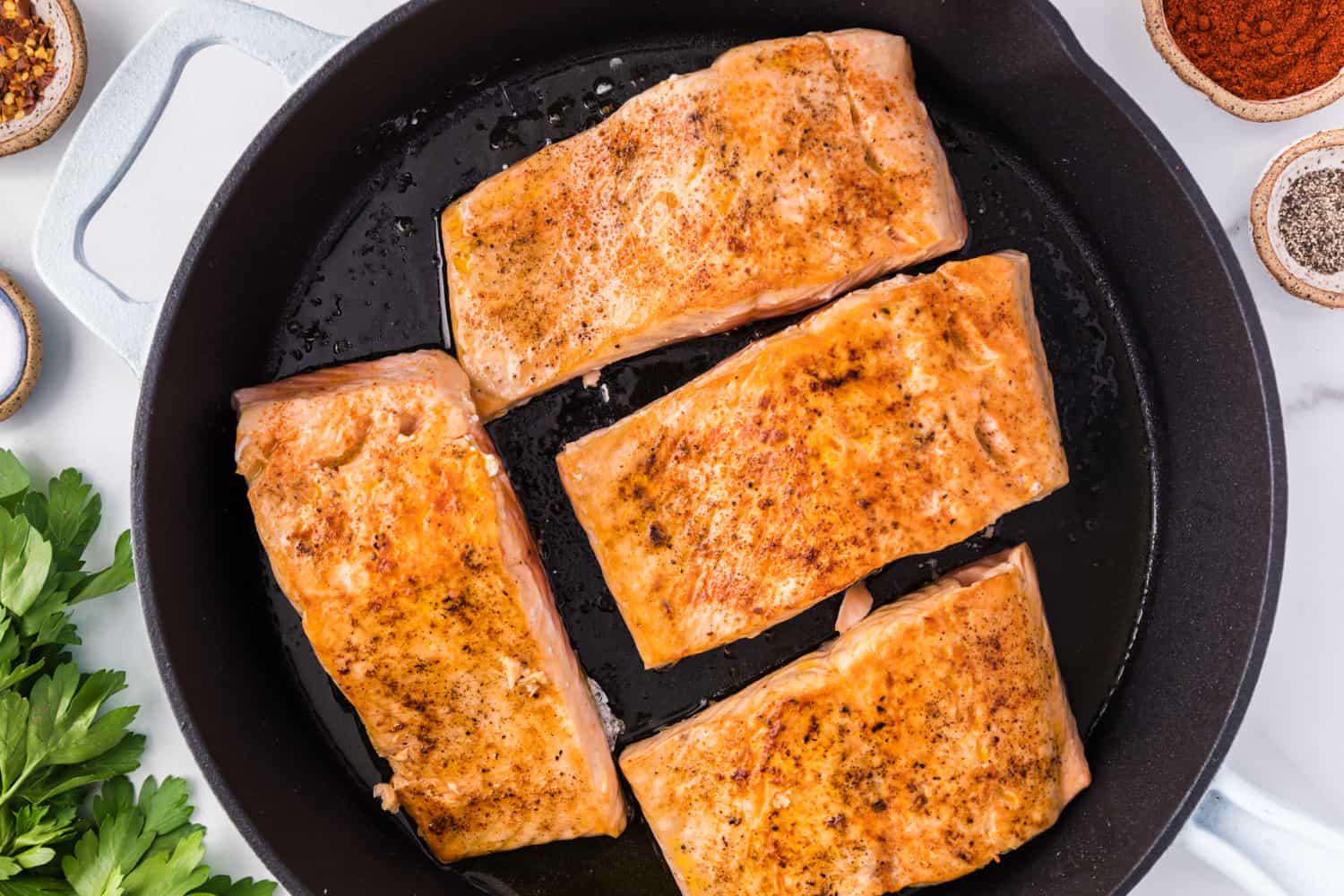 Salmon fillets, after searing.