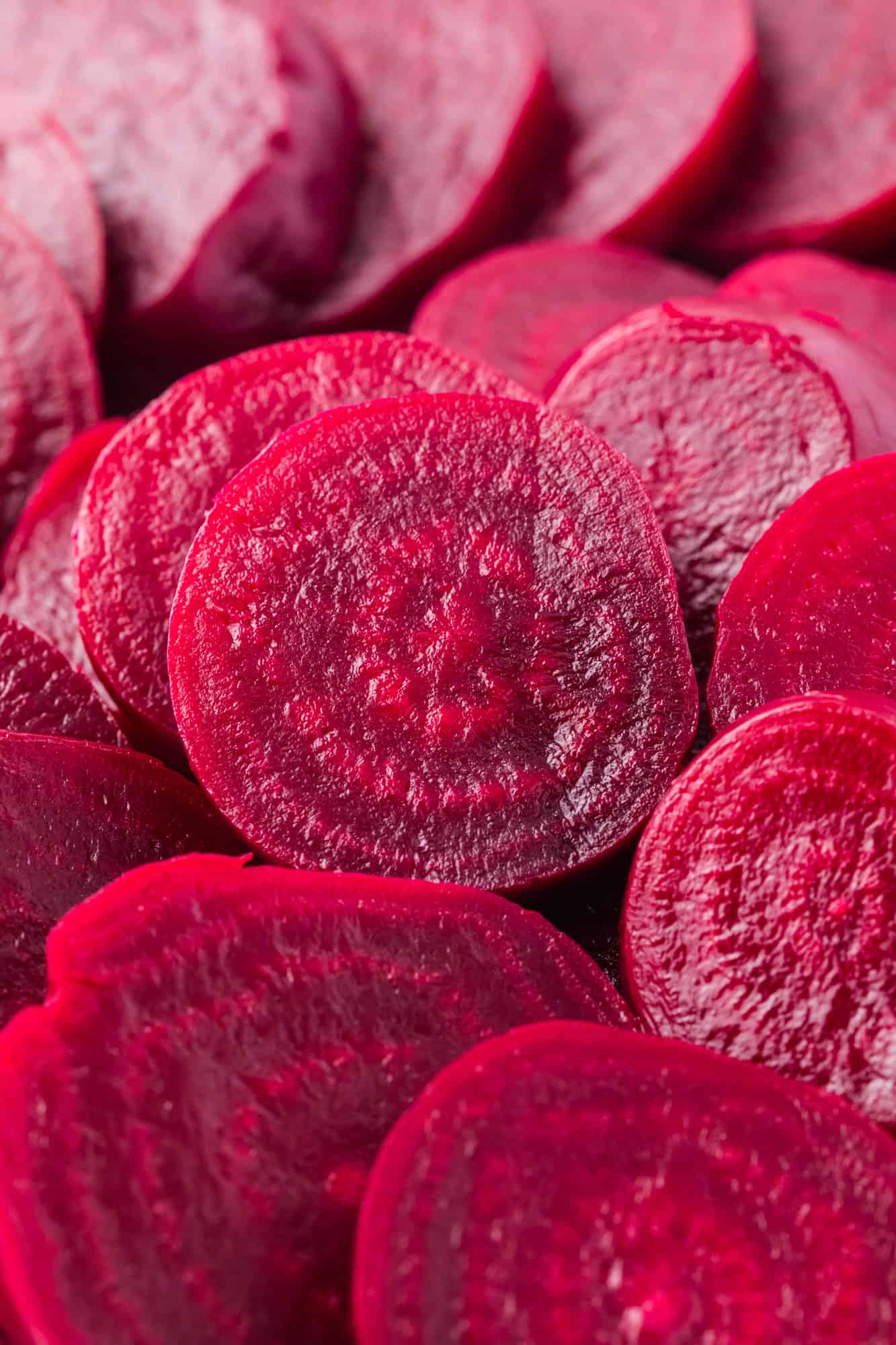 Boiled beets, cut into slices, a deep pink color.