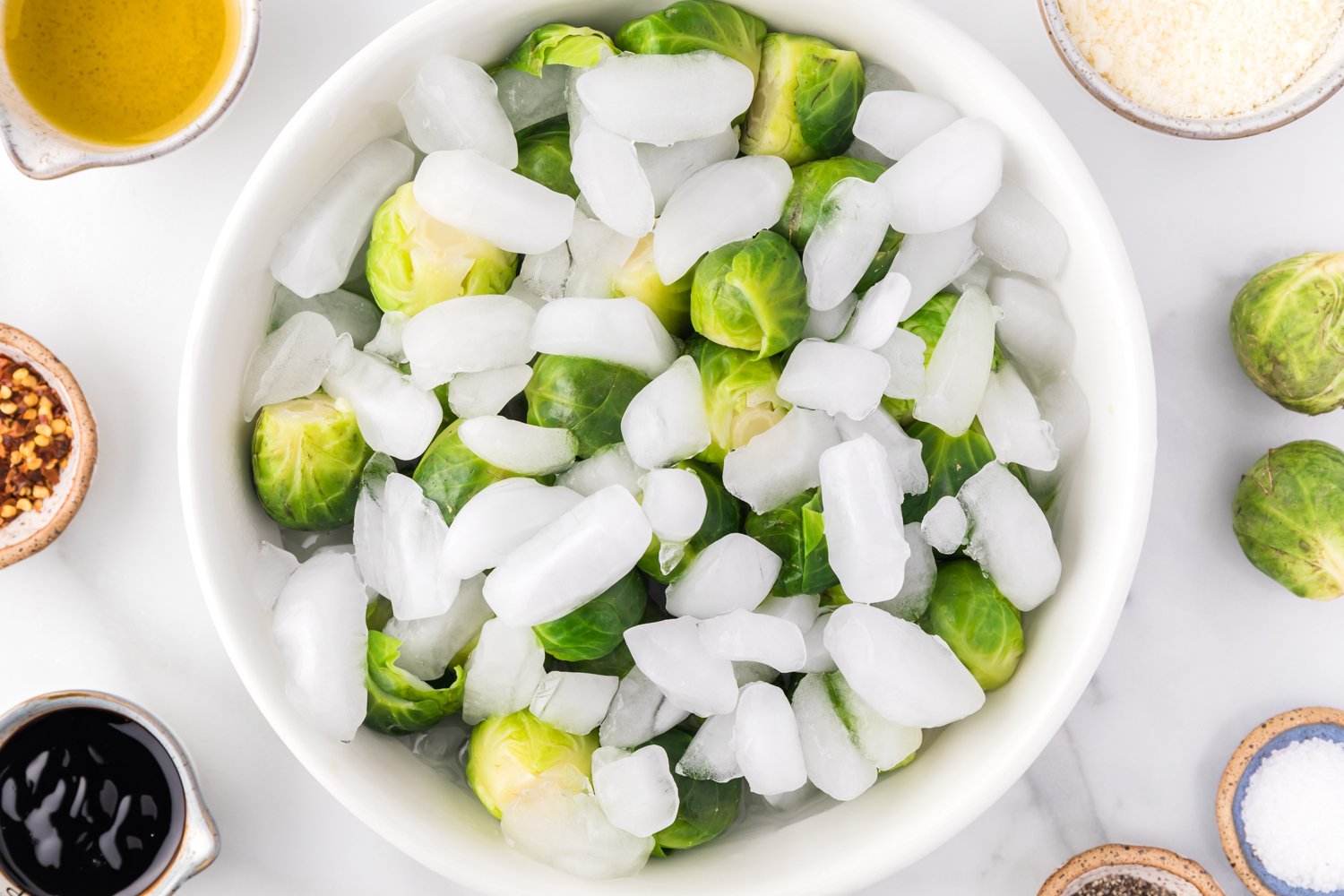 Brussels sprouts in an ice water bath.