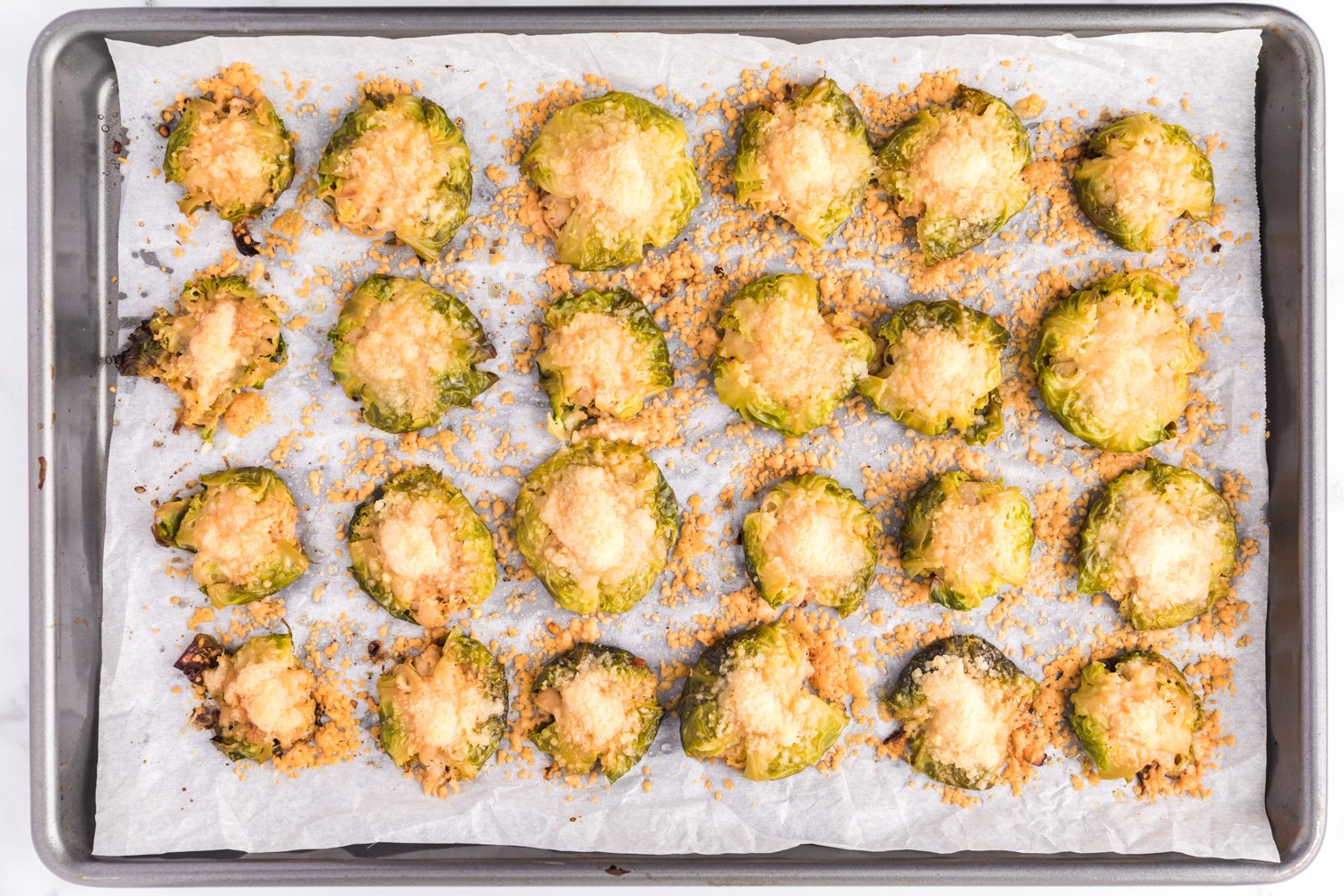 Cooked Brussels sprouts, still on sheet pan.